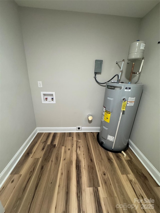 utility room with electric water heater