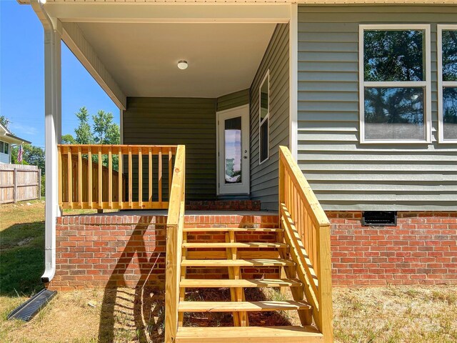 property entrance with fence