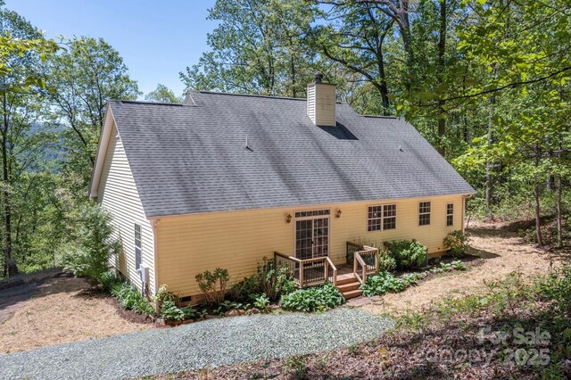 62 Mackenzie Way, Swannanoa, NC 28778 - back of property with crawl space, a wooden deck, roof with shingles, and a chimney