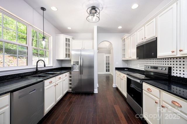 62 Mackenzie Way, Swannanoa, NC 28778 - kitchen with dark wood-style flooring, glass insert cabinets, white cabinets, a sink, and stainless steel appliances