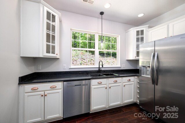 62 Mackenzie Way, Swannanoa, NC 28778 - kitchen with appliances with stainless steel finishes, a sink, white cabinets, glass insert cabinets, and dark wood-type flooring