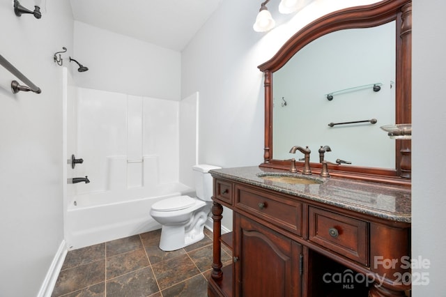 62 Mackenzie Way, Swannanoa, NC 28778 - bathroom with vanity, toilet, baseboards, stone finish flooring, and shower / bathing tub combination