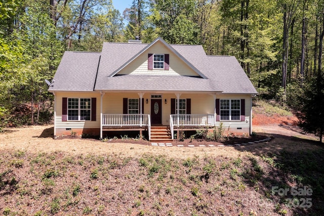 62 Mackenzie Way, Swannanoa, NC 28778 - farmhouse-style home with a porch, crawl space, a chimney, and a shingled roof