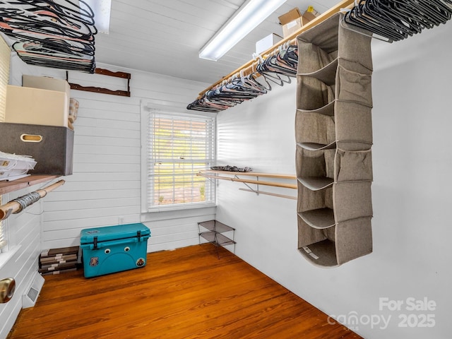 spacious closet featuring wood finished floors