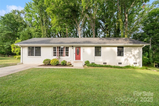 single story home featuring brick siding, a shingled roof, a front lawn, and crawl space