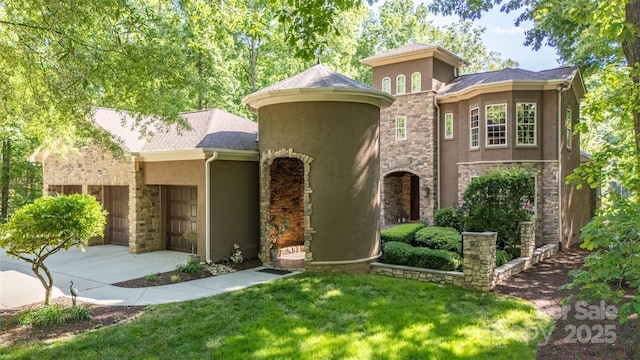 135 Sumter Dr, Mooresville, NC 28117 - view of front of house with driveway, stone siding, and stucco siding