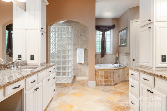 135 Sumter Dr, Mooresville, NC 28117 - bathroom with a walk in shower, vanity, and a bath