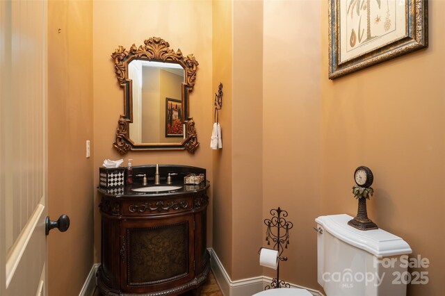 135 Sumter Dr, Mooresville, NC 28117 - half bathroom featuring toilet and vanity