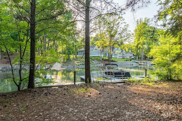 135 Sumter Dr, Mooresville, NC 28117 - exterior space with a water view and a dock