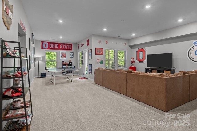 7620 Porrera St, Charlotte, NC 28214 - living room featuring carpet floors, plenty of natural light, baseboards, and recessed lighting