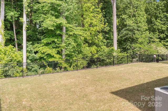7620 Porrera St, Charlotte, NC 28214 - view of yard with fence and central AC