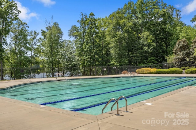 7620 Porrera St, Charlotte, NC 28214 - pool featuring fence