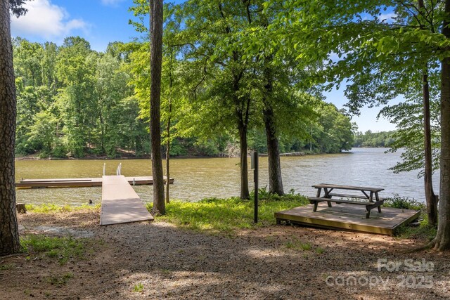 7620 Porrera St, Charlotte, NC 28214 - view of dock with a water view and a wooded view