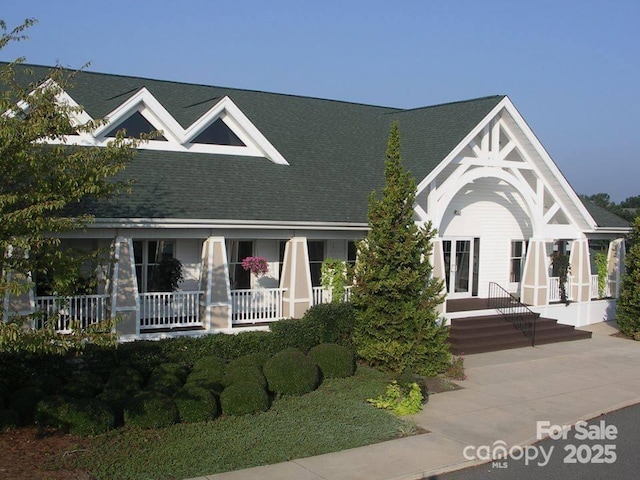 7730 Burning Ridge Dr, Stanley, NC 28164 - view of front of house featuring covered porch and roof with shingles