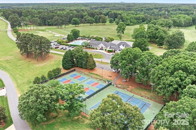 7730 Burning Ridge Dr, Stanley, NC 28164 - aerial view of a heavily wooded area and a golf course