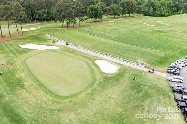 7730 Burning Ridge Dr, Stanley, NC 28164 - view of home's community with view of golf course and view of scattered trees
