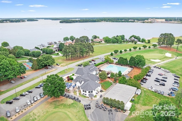 7730 Burning Ridge Dr, Stanley, NC 28164 - aerial view of property and surrounding area with a large body of water and a local golf course