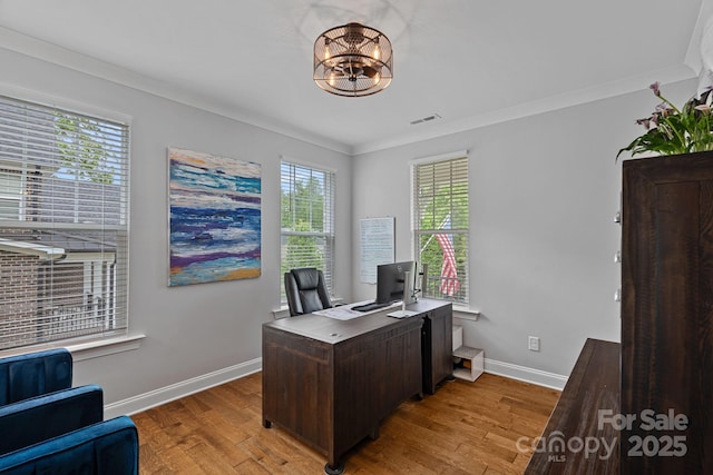 7730 Burning Ridge Dr, Stanley, NC 28164 - home office with baseboards, light wood-style floors, and a chandelier