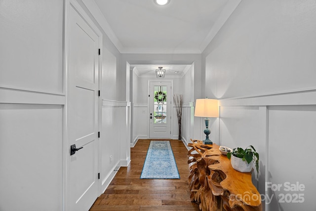 7730 Burning Ridge Dr, Stanley, NC 28164 - foyer entrance with a decorative wall, dark wood-style flooring, a wainscoted wall, crown molding, and recessed lighting