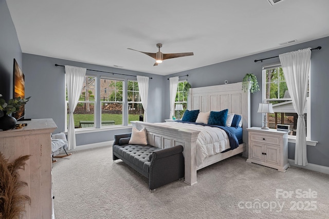 7730 Burning Ridge Dr, Stanley, NC 28164 - bedroom with baseboards, light carpet, and ceiling fan