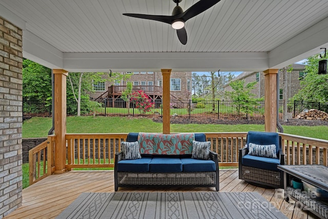 7730 Burning Ridge Dr, Stanley, NC 28164 - wooden terrace with a ceiling fan and an outdoor living space