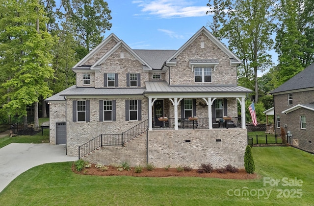 7730 Burning Ridge Dr, Stanley, NC 28164 - view of front facade with covered porch, concrete driveway, brick siding, and stairway