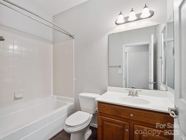 full bathroom featuring vanity, toilet, and tub / shower combination
