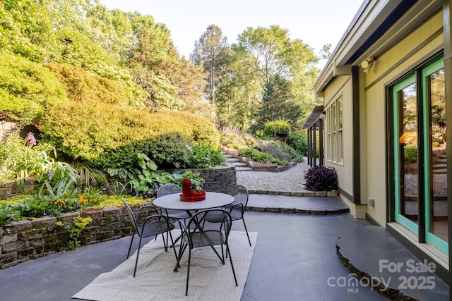 view of patio with outdoor dining area