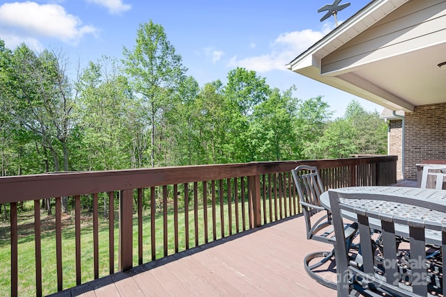 deck featuring a yard