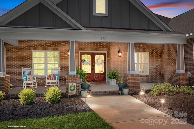 730 Oak Ridge Farms Cir Unit 14, Newton, NC 28658 - property entrance with covered porch, board and batten siding, and brick siding