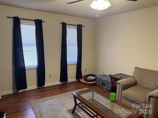 116 Fairview St, Shelby, NC 28152 - living area featuring wood finished floors, a ceiling fan, plenty of natural light, and baseboards