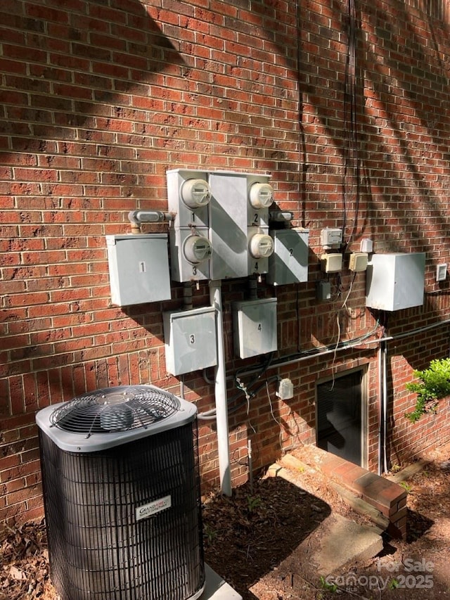 116 Fairview St, Shelby, NC 28152 - exterior view of central AC, brick siding, and electric meter