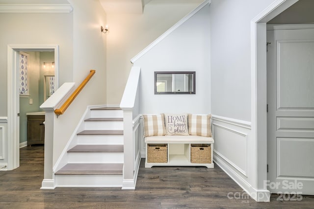 stairway featuring wood finished floors