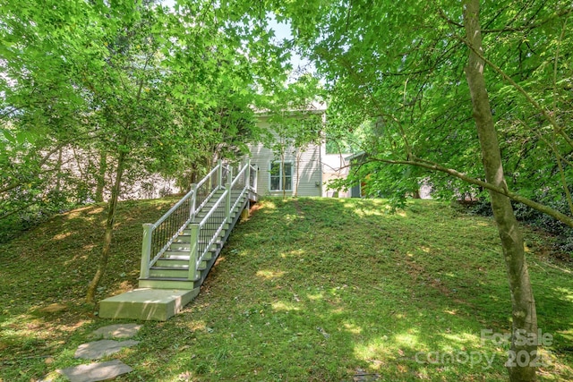 view of yard featuring stairs