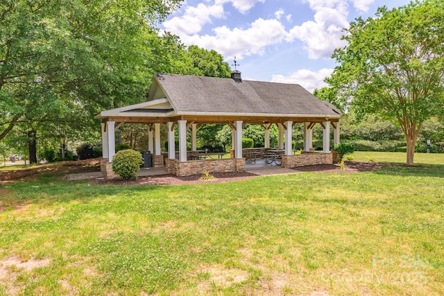 view of community with a gazebo and a lawn