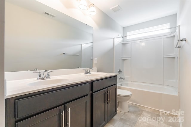 full bathroom with toilet, visible vents, and a sink