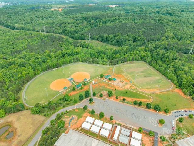aerial view featuring a view of trees