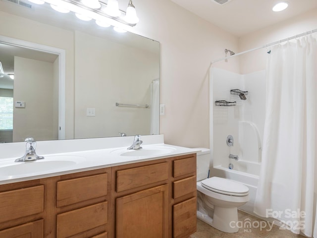 full bathroom featuring toilet, shower / bath combo, visible vents, and a sink