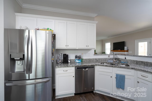 2205 Philadelphia Church Rd, Dallas, NC 28034 - kitchen featuring crown molding, light stone countertops, white cabinetry, a sink, and appliances with stainless steel finishes