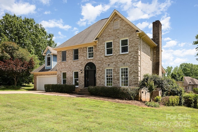 109 Arabian Ln, Salisbury, NC 28147 - view of front of home with a chimney, brick siding, and a front yard