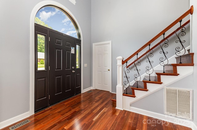109 Arabian Ln, Salisbury, NC 28147 - foyer with wood finished floors, baseboards, stairs, and a towering ceiling