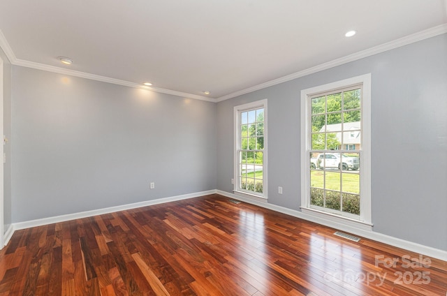 109 Arabian Ln, Salisbury, NC 28147 - unfurnished room with dark wood-style floors, baseboards, ornamental molding, and recessed lighting