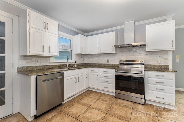 109 Arabian Ln, Salisbury, NC 28147 - kitchen with appliances with stainless steel finishes, wall chimney exhaust hood, a sink, decorative backsplash, and white cabinetry