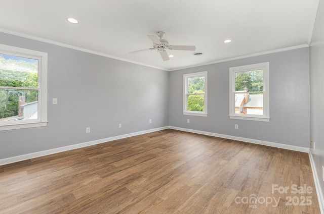 109 Arabian Ln, Salisbury, NC 28147 - spare room featuring healthy amount of natural light, wood finished floors, baseboards, ornamental molding, and recessed lighting