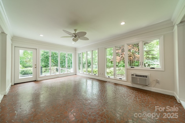 unfurnished sunroom with baseboards, a wall mounted AC, ornamental molding, french doors, and recessed lighting