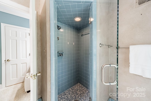 full bath with a shower stall