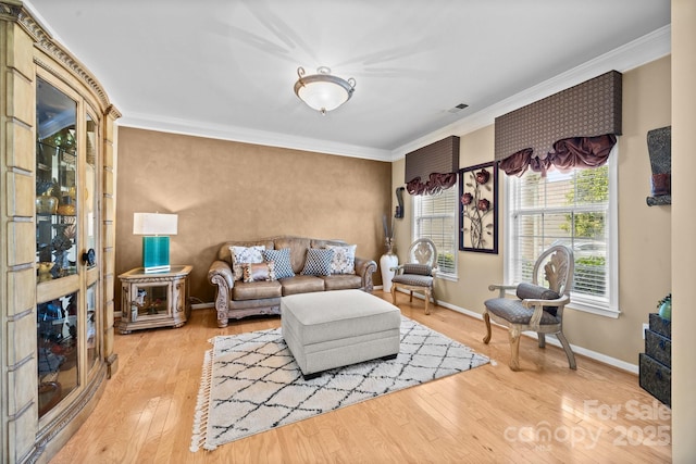 1900 Birchbrook Ct, Harrisburg, NC 28075 - living room with light wood-style floors and crown molding