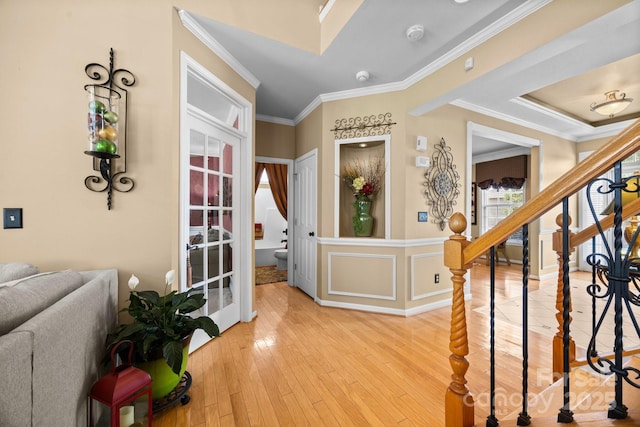 1900 Birchbrook Ct, Harrisburg, NC 28075 - foyer entrance with hardwood / wood-style flooring, crown molding, and stairway