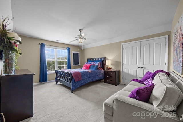 1900 Birchbrook Ct, Harrisburg, NC 28075 - bedroom featuring light colored carpet, a ceiling fan, and a closet