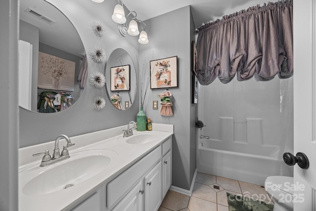 1900 Birchbrook Ct, Harrisburg, NC 28075 - full bath with tile patterned floors, double vanity, and shower / bath combination